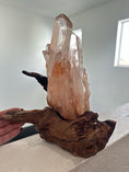 Load image into Gallery viewer, Red Clear Quartz Cluster on a hand crafted wood stand - Reiki Lunas Shop
